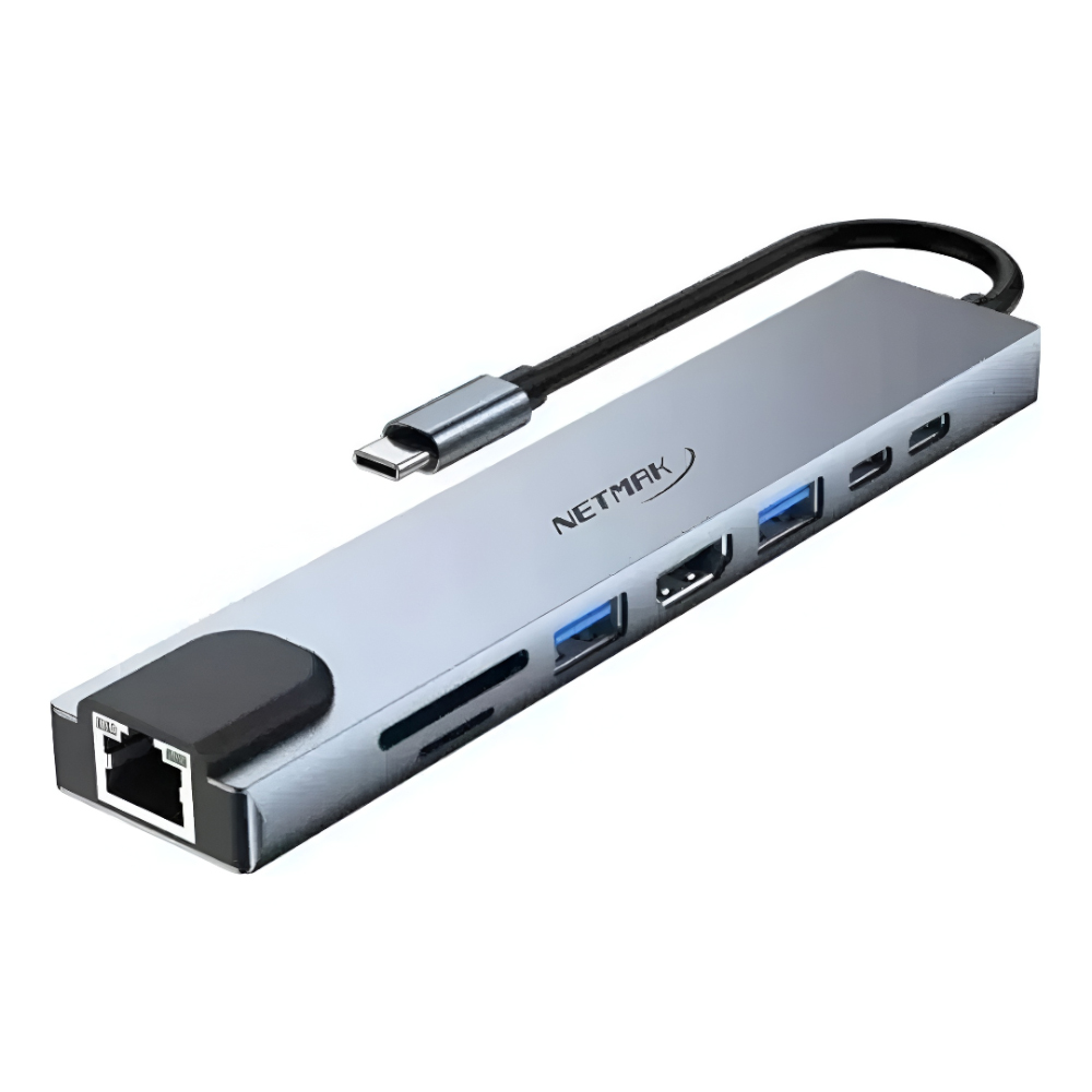 3956 NetMak USB-C multi-port hub with Ethernet, two USB-A 3.0 ports, HDMI, and SD/microSD card slots connected by a short cable.